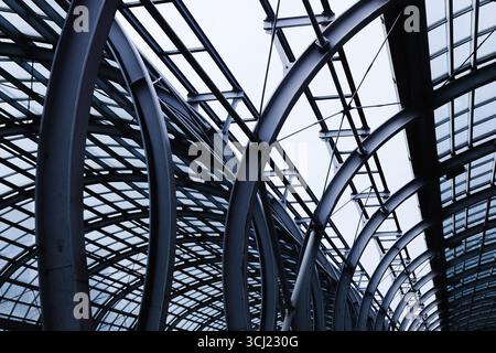 Modern glass architecture roof. Geometric structure with steel beams. Futuristic urban building design. Abstract architectural detail. Stock Photo