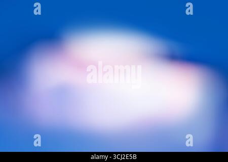 Colorful sky at sunset dawn sunrise blurred backdrop. Blurred motion minimalistic background of sky sunset. Stock Photo