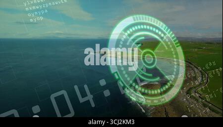 Displaying HUD hovering over coastal headland, with green reticle and code lines, copy space. Futuristic, technology, navigation, exploration, digital Stock Photo