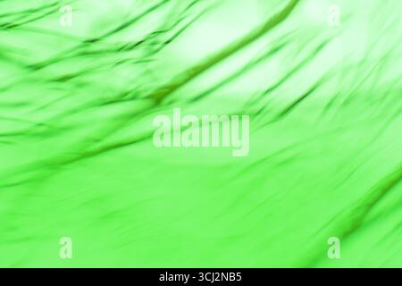 Abstract swirl blurry effect green background. Radial motion abstract green background. Stock Photo