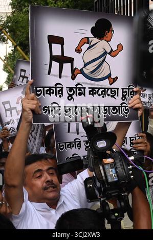 KOLKATA, INDIA - SEPTEMBER 4: LOP and Bharatiya Janata Party BJP MLA Suvendu Adhikari protest against alleged assault on BJP MLA Shankar Ghosh inside State Legislative Assembly House on September 4, 2025 in Kolkata, India. Tensions erupted when Speaker Biman Banerjee called in marshals to evict BJP MLA and party s chief whip, Dr Sankar Ghosh, following his suspension. BJP legislators stormed the well, chanting Jai Shri Ram slogans and stalling proceedings, even as the Trinamool Congress-led government sought to pass a motion condemning attacks on Bengali migrant workers in BJP-ruled states. Ph Stock Photo