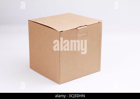 Close up of Brown cardboard box isolated on white background, Stock Photo