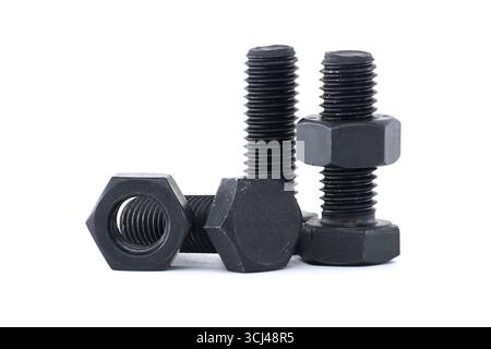 Various black bolts and nuts, showcasing their intricate details against a bright white backdrop, highlighting their robust design. Stock Photo