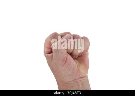 A detailed image showcasing a human fist closed tightly, symbolizing power, unity, or determination. The background is minimalist, highlighting the ha Stock Photo