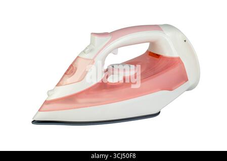 A detailed studio shot of a modern pink and white cordless steam iron, isolated on a clean white background Stock Photo