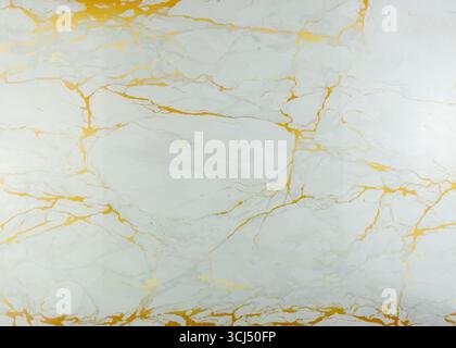 A white glass surface streaked with dynamic irregular golden lines suitable as a background Stock Photo