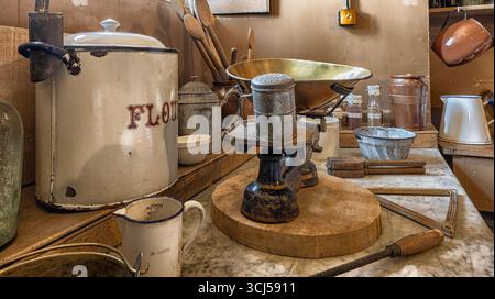 Belvoir Castle - English historic castle and stately home - Leicestershire, England, UK - kitchen cooking items in the kitchen on display Stock Photo