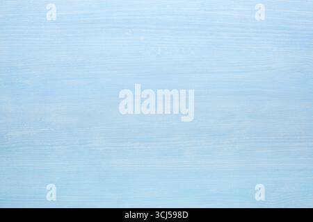 Light blue painted natural wooden background. Top view Stock Photo