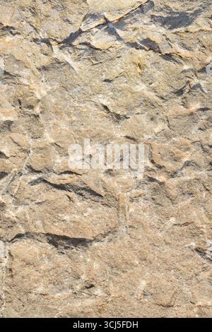 Macro detail background of irregular stone block. Top view. Stock Photo