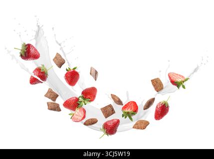 Splashing milk with sweet corn pads and fresh strawberries in air against white background. Healthy breakfast Stock Photo