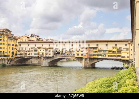 the historic ponte vecchio over the river arno in florence tuscany italy Stock Photo