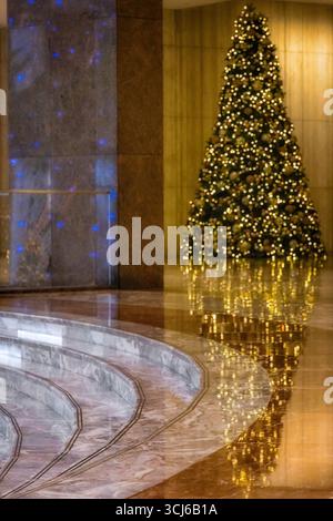 Christmas Tree Reflections - One of the many illuminated and decorated Christmas Holiday Stock Photo