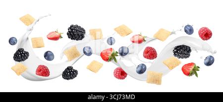 Splashing milk with sweet corn pads and fresh berries in air against white background. Healthy breakfast Stock Photo