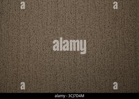 Vertical pattern dotted textured brown wall Stock Photo