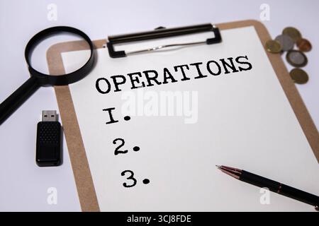 Calculator and sticky note with the number 123 on a red background Stock Photo