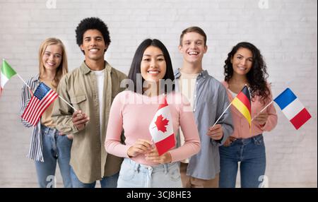 Young students of language school celebrate holiday Stock Photo