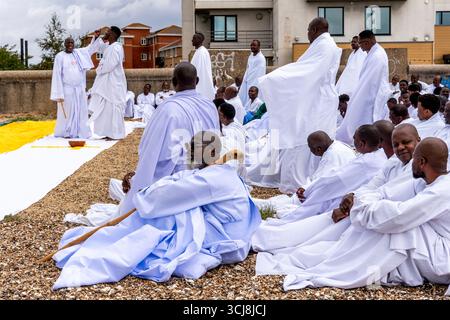 Members of The Apostles of Muchinjikwa Church Gather On The Beach At Southend For Their Annual Baptism In The Sea Event,  Southend-On-Sea, Essex, UK. Stock Photo