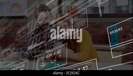 Typing man and woman reviewing project on laptop and smartphone at office table, with code overlays Stock Photo