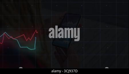 Displaying hands holding smartphone showing data charts at desk featuring grid overlay, line graphs Stock Photo