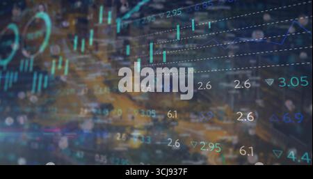 Displaying financial graphics over urban night intersection with numeric overlays, candlestick bars Stock Photo