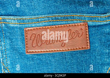 Pruszcz Gdanski, Poland - March 11, 2025: Wrangler Jeans logo on blue jeans. Stock Photo