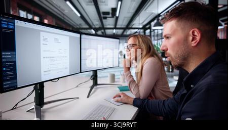 Businesswoman Managing Spreadsheets On Desktop PC In Virtual Finance Office. Stock Photo