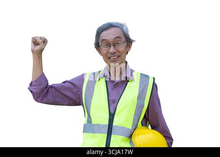 Asian senior old man engineer standing happy smiling hand fist rising for job success finish working isolated on white background with clipping path Stock Photo