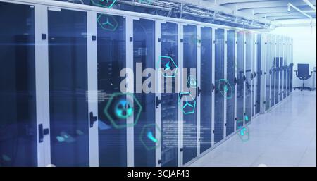 Displaying row of glass-front racks in data center corridor, with neon blue holographic icons Stock Photo