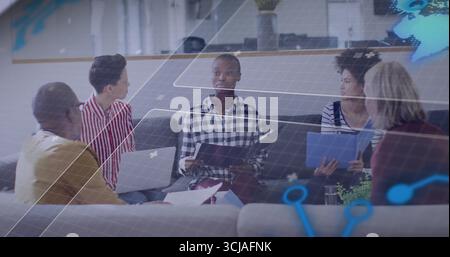 Woman holding folder and typing on laptop in office lounge with holographic graphics and table Stock Photo