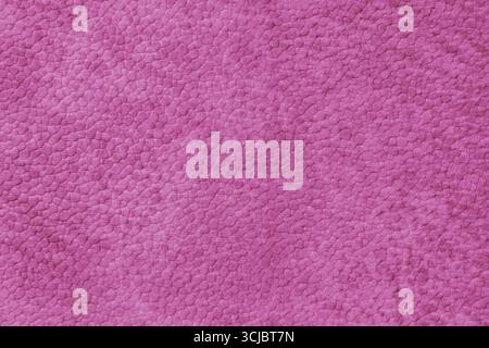 Detailed close up, macro of pink synthetic suede leather texture, faux leather, leatherette. Background for design, fashion, upholstery material visua Stock Photo