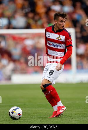 George Broadbent of Doncaster Rovers in action during the Sky Bet ...