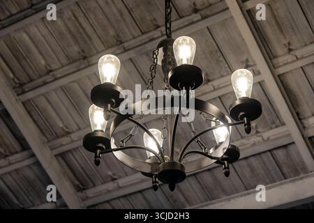 View of vintage ceiling light. Lighting decoration concept. Modern hanging ceiling lamps Stock Photo