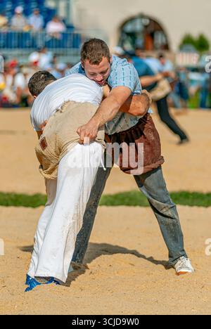 Swiss wrestlers fighting at the NOS 2012 in Silvaplana, Switzerland Stock Photo
