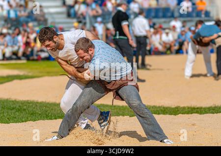 Swiss wrestlers fighting at the NOS 2012 in Silvaplana, Switzerland Stock Photo