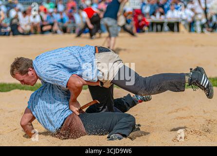 Swiss wrestlers fighting at the NOS 2012 in Silvaplana, Switzerland Stock Photo