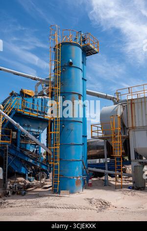 Large plant pipes and ladders on blue sky background close up Stock ...