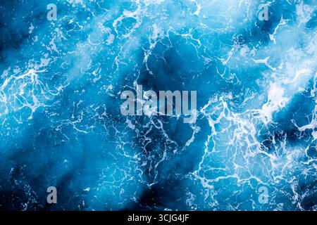 Ocean surface background. Top view of beautiful foamy water. Can be used in covers, packaging, posters, textures, brochures, art and design projects. Stock Vector