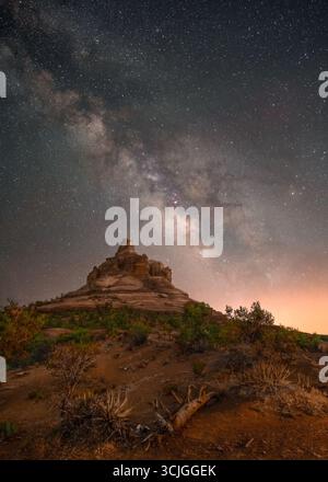 Stars and night sky of Milky Way Galaxy over rock formation in Sedona Arizona Stock Photo