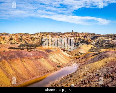 The remains of open-cast copper mining at Parys Mountain, Anglesey, Wales, UK Stock Photo