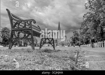 Bench in a park, Witney, Oxfordshire, Uk Stock Photo