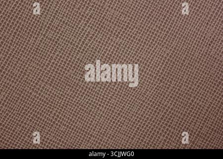 Soft cocoa brown textured surface with fine mesh grain and warm neutral tone. Concept of earthy elegance, natural softness, tactile warmth Stock Photo