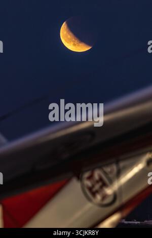 Lisbon, Portugal. 07th Sep, 2025. A red full moon, also known as a blood moon, is seen during a lunar eclipse over an aircraft placed as a monument at Air Base No. 1 in Sintra. (Photo by Henrique Casinhas/SOPA Images/Sipa USA) Credit: Sipa USA/Ģ����ý Live News Stock Photo