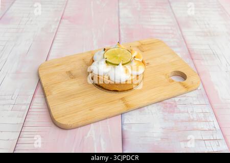 Mini Lemon and Meringue Tartlets: Perfect for Parties with a Golden Topping Stock Photo