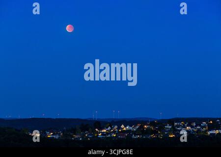 lunar eclipse over Wetter-Volmarstein, blood moon, 07.09 2025, North Rhine-Westphalia, Germany. Mondfinsternis ueber Wetter-Volmarstein, Blutmond, 07. Stock Photo