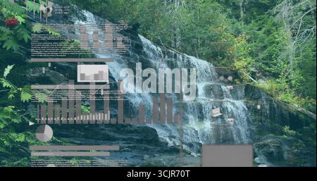 Cascading waterfall flowing over mossy rock ledges at forest creek pool, with data overlays Stock Photo