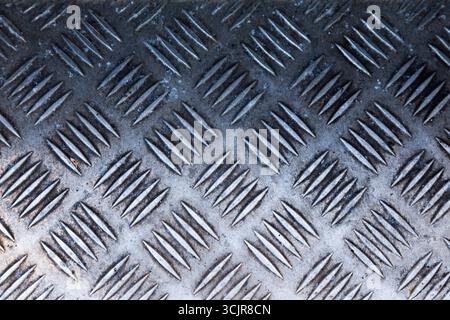 Steel industrial floors. Steel corrugated deck with anti-slip lugs. Stock Photo