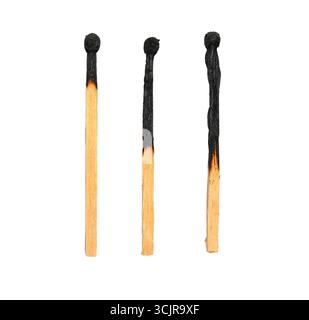 Three burned wooden matches isolated on white, clipping path Stock Photo