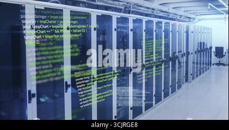 Showing server cabinets displaying blinking LEDs in data center with code panels and swivel chair Stock Photo