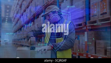 Warehouse worker applying packing tape to cardboard box in warehouse, with dispenser and overlay Stock Photo