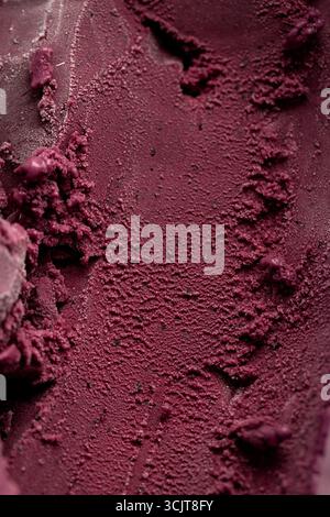 Close-up texture of rich red berry sorbet, vibrant and refreshing frozen dessert background Stock Photo